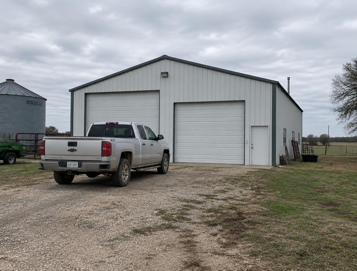 Metal shop building on a farm